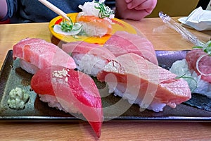 A selection of meticulously crafted Toro, Chutoro, and Maguro tuna sushi pieces