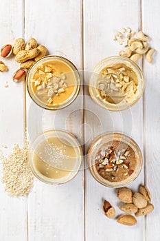 Selection of nut butters - peanut, cashew, almond and sesame seeds