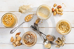 Selection of nut butters - peanut, cashew, almond and sesame seeds
