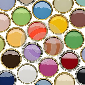 selection of open paint tins with many colors