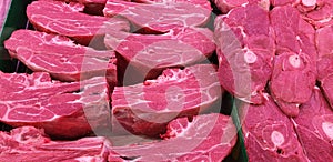 A selection of red meat in a supermarket