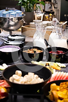 Selection of self service catering continental breakfast buffet display, catering or brunch table