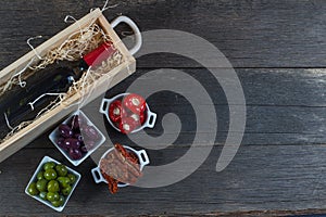 Selection of spanish tapas with red wine