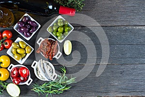 Selection of spanish tapas with red wine