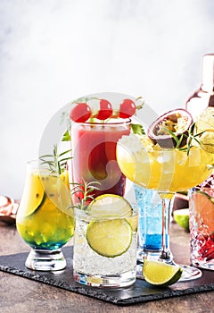 Selection of summer alcoholic cocktails, popular bright refreshing alcohol drinks and beverages