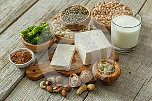 Selection vegan protein sources on wood background