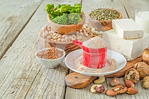 Selection vegan protein sources on wood background