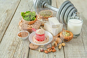 Selection vegan protein sources on wood background