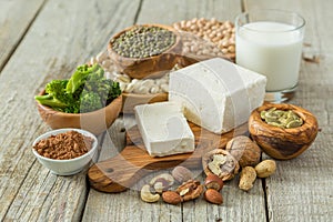 Selection vegan protein sources on wood background