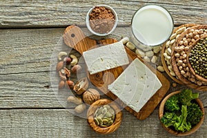 Selection vegan protein sources on wood background