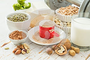 Selection vegan protein sources on wood background