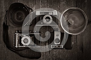 Selection of vintage film cameras with one modern DSLR