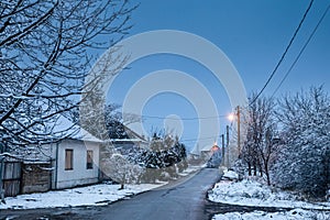 Selective blur on an empty road and street in the village of Bavaniste, in Vojvodina, Banat, Serbia, in the countryside, covered