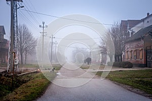 Selective blur on an empty road and street in the village of Vladimirovac in Vojvodina, Banat, Serbia, in the countryside photo