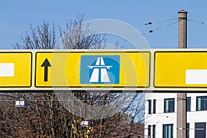 Selective blur on a german roadsign in Wuppertal, Germany, indicating directions to autobahn motorway. Such highways are known to