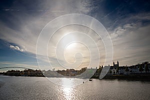 Selective blur on the Maastricht Waterfront on the Meuse Maas river with a focus on the hoge brug bridge, in autumn, during a