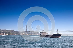 Selective blur on oil tanker carrying gas and petroleum cruising on the bosphorus strait in front of istanbul 15 july martyrs