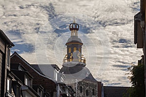 Selective blur on the steeple clocktwoer of the basilica of Saint Ursula in the afternoon. Sankt Ursula kirche is a Catholic