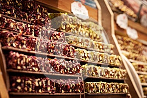 Selective blur on turkish delights, or rahalt lokum, for sale at a stall of Istanbul Misir Carsisi spice market.