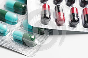selective focus of antibiotic capsules pills on blur background