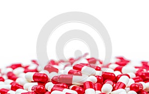 Selective focus of antibiotic capsules pills on white background