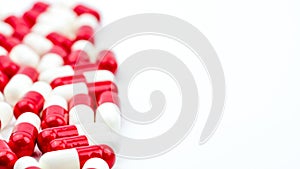 Selective focus of antibiotic capsules pills on white background