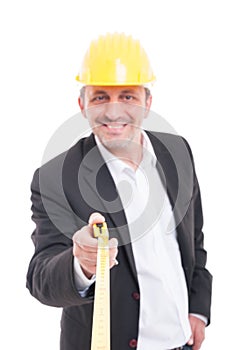 Selective focus of architect smiling holding ruler tape