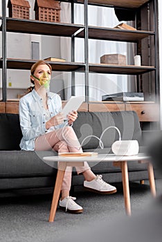 Focus of asthmatic woman using compressor photo