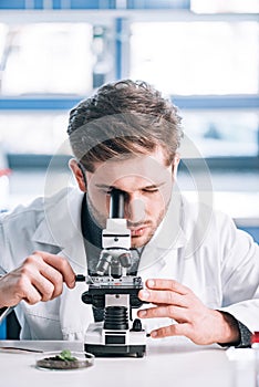 selective focus of bearded biochemist in