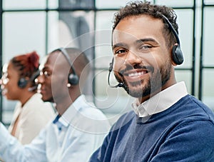 call center operator in headset working in office.