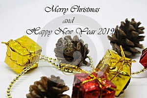 Selective focus Christmas ornaments with text written - Merry Christmas and Happy new year 2019