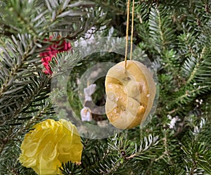 selective focus on Christmas tree decoration made of cookies and pretzels