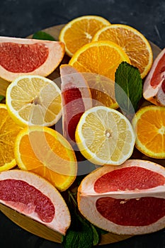 selective focus, citrus fruit on dark background