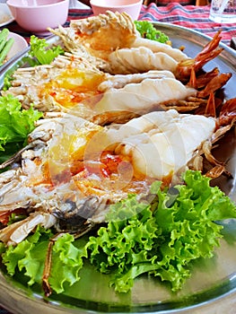 Selective focus, Close up of barbecued shrimp on tray in restaurant