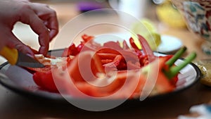 Selective focus close up of deseeding a red pepper