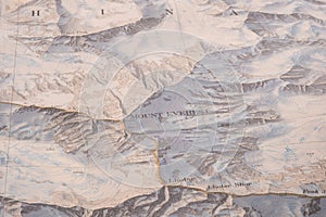 Selective focus close up of map detail of Mt. Everest topographical map showing contour lines, elevation photo