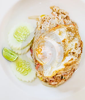 Selective focus close up traditional Thai Asian cuisine food menu: delicious Thai fermented pork fried rice with fried egg