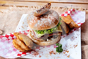 Selective focus closeup of a burger on a plate