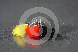 Selective focus closeup shot of colorful tranquilizer darts