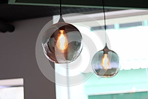 Selective focus closeup shot of modern round light lamps