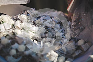 Selective focus closeup of wedding ribbon corsages