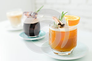 Selective focus of cocktails or mocktails with fruits in glasses.Traditional summer drink alcoholic cocktail with orange and grape