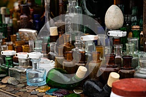 selective focus, colored glass bottles from perfume