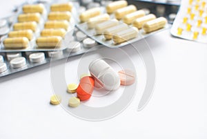 Selective focus of colorful Medical Pills on white background. closeup. Healthcare and medicine. Medical pharmacy