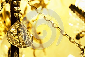 Selective focus of Crystal chandlier and lighting bokeh for background