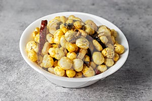 Selective focus of delicious Makhana chaat, made of roasted lotus seeds.