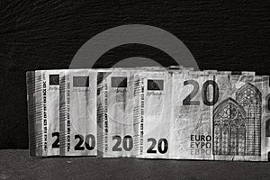 Selective focus on detail of euro banknotes. Close up macro detail of money banknotes, 20 euro isolated. World money concept,