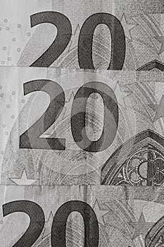 Selective focus on detail of euro banknotes. Close up macro detail of money banknotes, 20 euro isolated. World money concept,