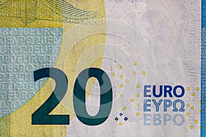 Selective focus on detail of euro banknotes. Close up macro detail of money banknotes, 20 euro isolated. World money concept,