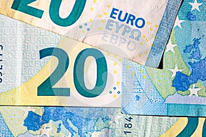 Selective focus on detail of euro banknotes. Close up macro detail of money banknotes, 20 euro isolated. World money concept,